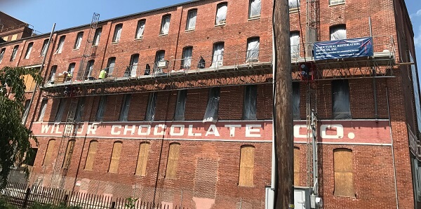 The side of the Wilbur Chocolate building after being restored