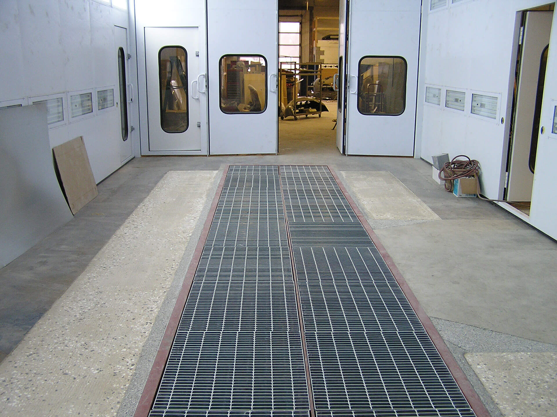 Completed Paint Booth with Ventilation Grate Installed
